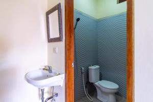 Koupelna v ubytování Kacu Ubud Inn