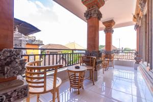Balkón nebo terasa v ubytování Kacu Ubud Inn