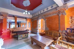 Posezení v ubytování Kacu Ubud Inn
