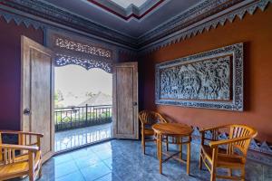 Posezení v ubytování Kacu Ubud Inn