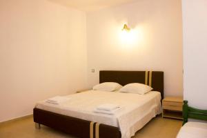 Posteľ alebo postele v izbe v ubytovaní Sahas Apartments