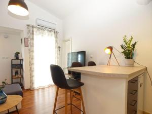 TV a/nebo společenská místnost v ubytování Apartments Ilija 1363