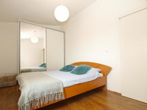 Postel nebo postele na pokoji v ubytování Apartments Ilija 1363