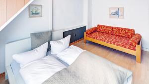 Postel nebo postele na pokoji v ubytování Hotel Cornelia