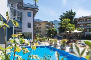a view of a hotel with a swimming pool at Arco Smart Hotel in Arco