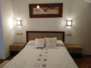 Cama o camas de una habitación en Chalet en Combarro a pie de playa