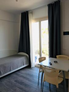 Posteľ alebo postele v izbe v ubytovaní Andrea Case Vacanze L'Ancora