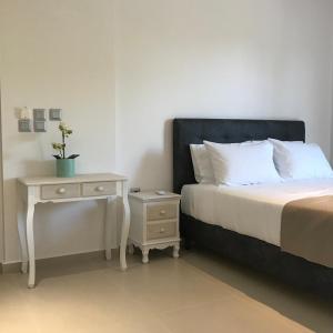 Postel nebo postele na pokoji v ubytování The Little Prince Luxury Suites