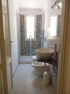 Koupelna v ubytování Giardino della Nonna Bice - locazioni turistiche