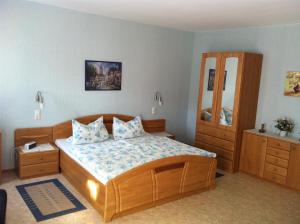 Postel nebo postele na pokoji v ubytování Ferienwohnungen und Appartements - Haus Budinger