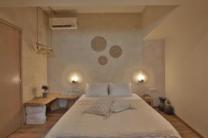 Postel nebo postele na pokoji v ubytování Ederlezi Boutique Hotel