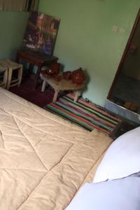 En eller flere senger på et rom på Gîte Atlas Mazik
