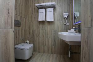 Koupelna v ubytování Emerald Boutique Hotel
