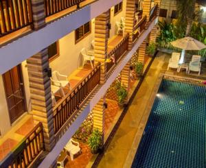 an overhead view of a hotel with a swimming pool at Hathai House in Lamai