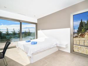 Postel nebo postele na pokoji v ubytování Villa Exorbo by Interhome