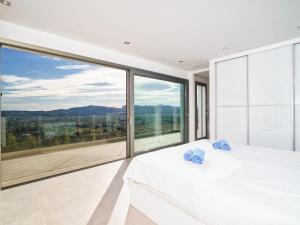 Postel nebo postele na pokoji v ubytování Villa Exorbo by Interhome