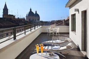 Uma varanda ou terraço em UNA HOTELS Decò Roma