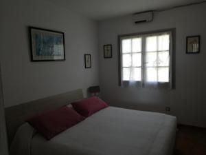 Giường trong phòng chung tại Siesta mar 2