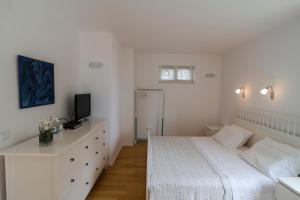 Llit o llits en una habitació de Suncana Apartments Dubrovnik 2