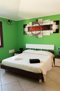 Postel nebo postele na pokoji v ubytování Is Seddas B&B
