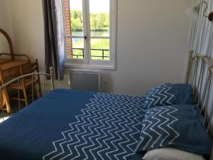 Postel nebo postele na pokoji v ubytování Bar Le Lac