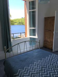 Postel nebo postele na pokoji v ubytování Bar Le Lac