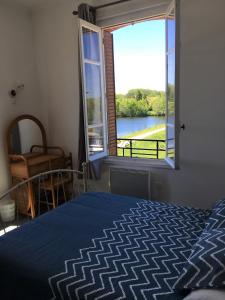 Postel nebo postele na pokoji v ubytování Bar Le Lac