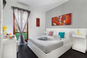 Ένα ή περισσότερα κρεβάτια σε δωμάτιο στο Hotel Herculaneum