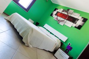 Postel nebo postele na pokoji v ubytování Is Seddas B&B
