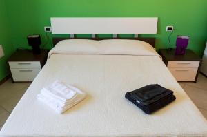Postel nebo postele na pokoji v ubytování Is Seddas B&B