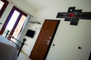 TV a/nebo společenská místnost v ubytování Is Seddas B&B