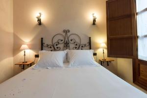 A bed or beds in a room at Complejo Rural Turimaestrat