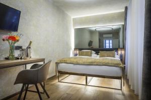 Letto o letti in una camera di Hotel Waldstein