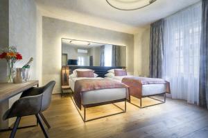 Letto o letti in una camera di Hotel Waldstein