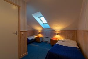 Voodi või voodid majutusasutuse Villa Kuus Sõlme - Sea View Holiday Home toas