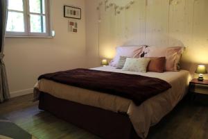 Postel nebo postele na pokoji v ubytování Le Val Daninière