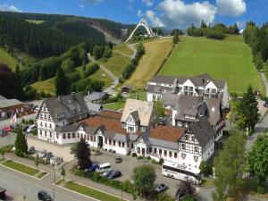an aerial view of a large house in a town at Vakantiehotel Der Brabander Apartments in Winterberg
