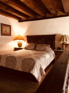 Łóżko lub łóżka w pokoju w obiekcie Casa Eugenia Hotel