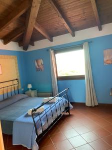 Кровать или кровати в номере Villa Angeli Luxury Piscina Esclusiva