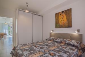 Postel nebo postele na pokoji v ubytování Apartman Madonnina