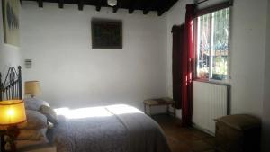 Postel nebo postele na pokoji v ubytování Venta Real 12v