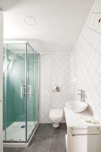 Ванна кімната в PRINCIPE REAL Apartments