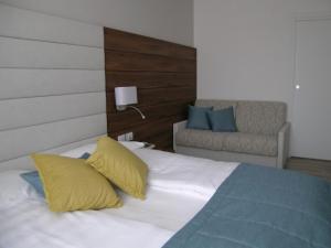 Cama ou camas em um quarto em Hotel Belvedere