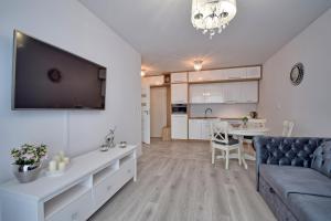 Kuchyňa alebo kuchynka v ubytovaní AMD Apartamenty Bliżej Morza