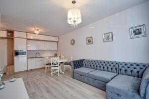 Kuchyňa alebo kuchynka v ubytovaní AMD Apartamenty Bliżej Morza