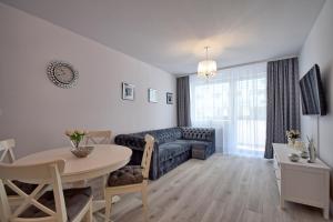 Posedenie v ubytovaní AMD Apartamenty Bliżej Morza