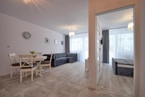 Posedenie v ubytovaní AMD Apartamenty Bliżej Morza