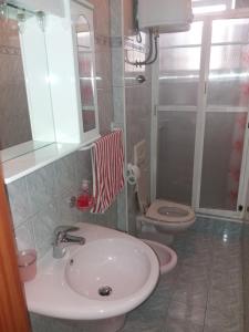 Koupelna v ubytování Apartmani Nina