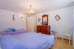 Postel nebo postele na pokoji v ubytování Apartment Carmen