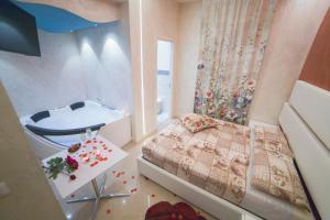 Postel nebo postele na pokoji v ubytování Luxury B&B Coccolhouse + 37 fotografií